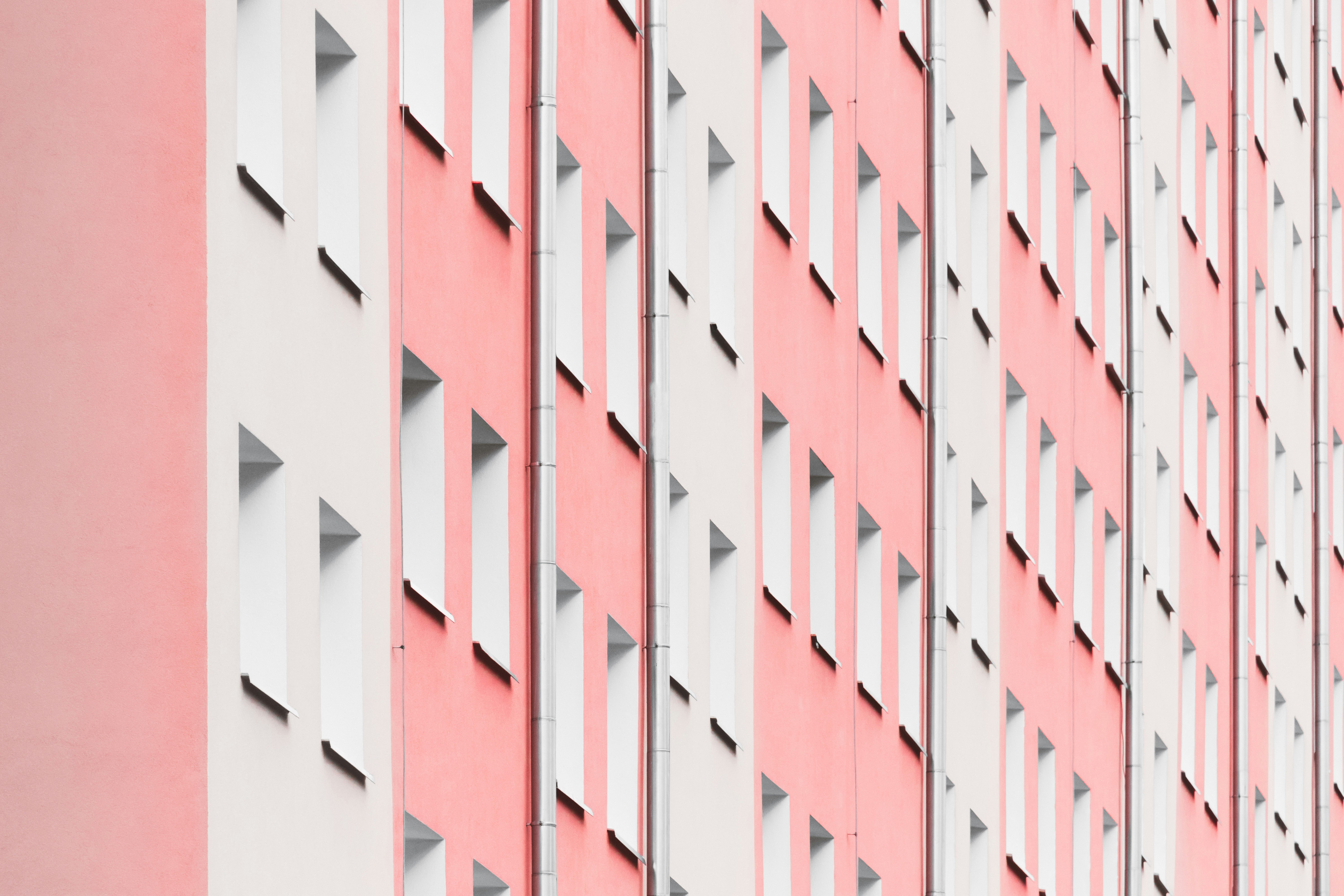 white and pink concrete building